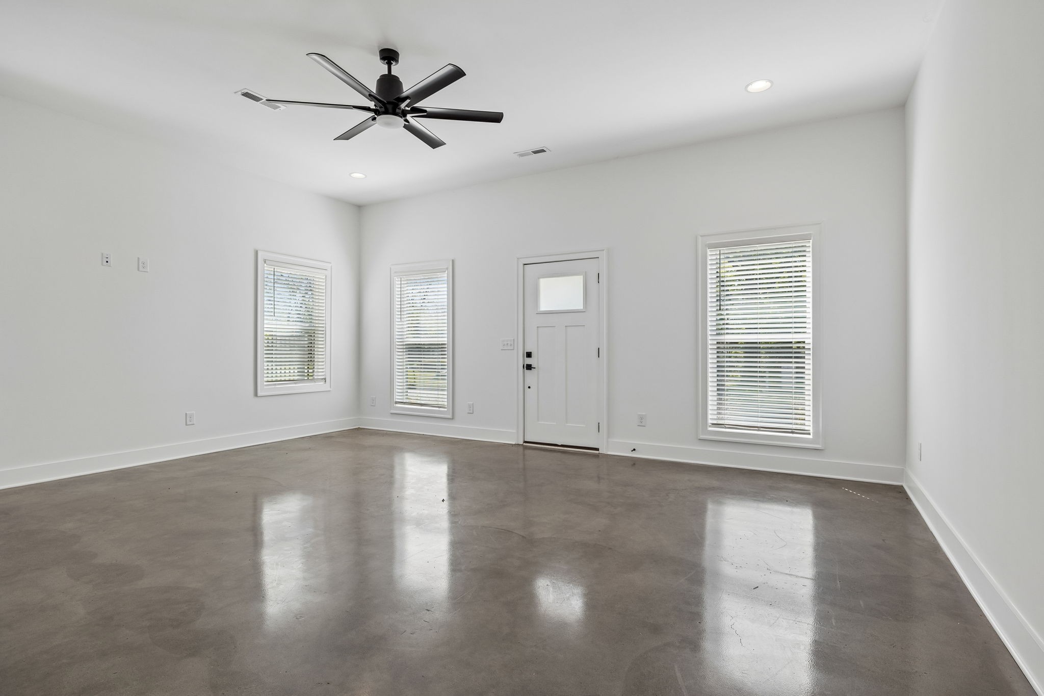 904 North Maple Street Murfreesboro, TN 37130 - Photo 8 of 34 a view of an empty room with a window and a kitchen