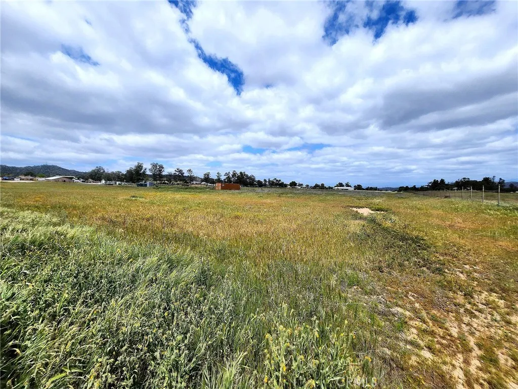 0 Inyo Winchester, CA 92596 - Photo 7 of 15 a view of a lake and a houses in the background