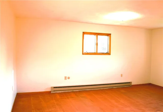 a view of a room that has a window in it