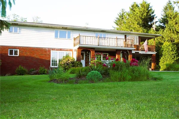 a house view with a garden space