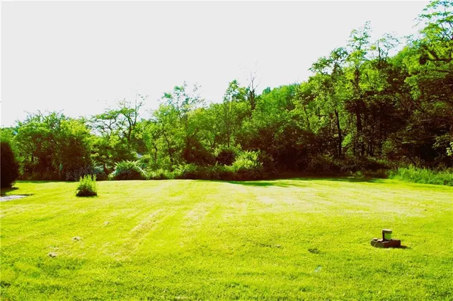 a kitchen with stainless steel appliances granite countertop a refrigerator and sink