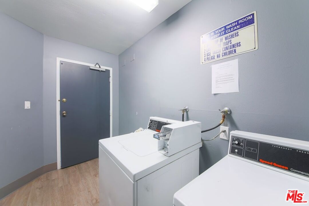 7342 Haskell Avenue Van Nuys, CA 91406 - Photo 8 of 10 a utility room with dryer and washer