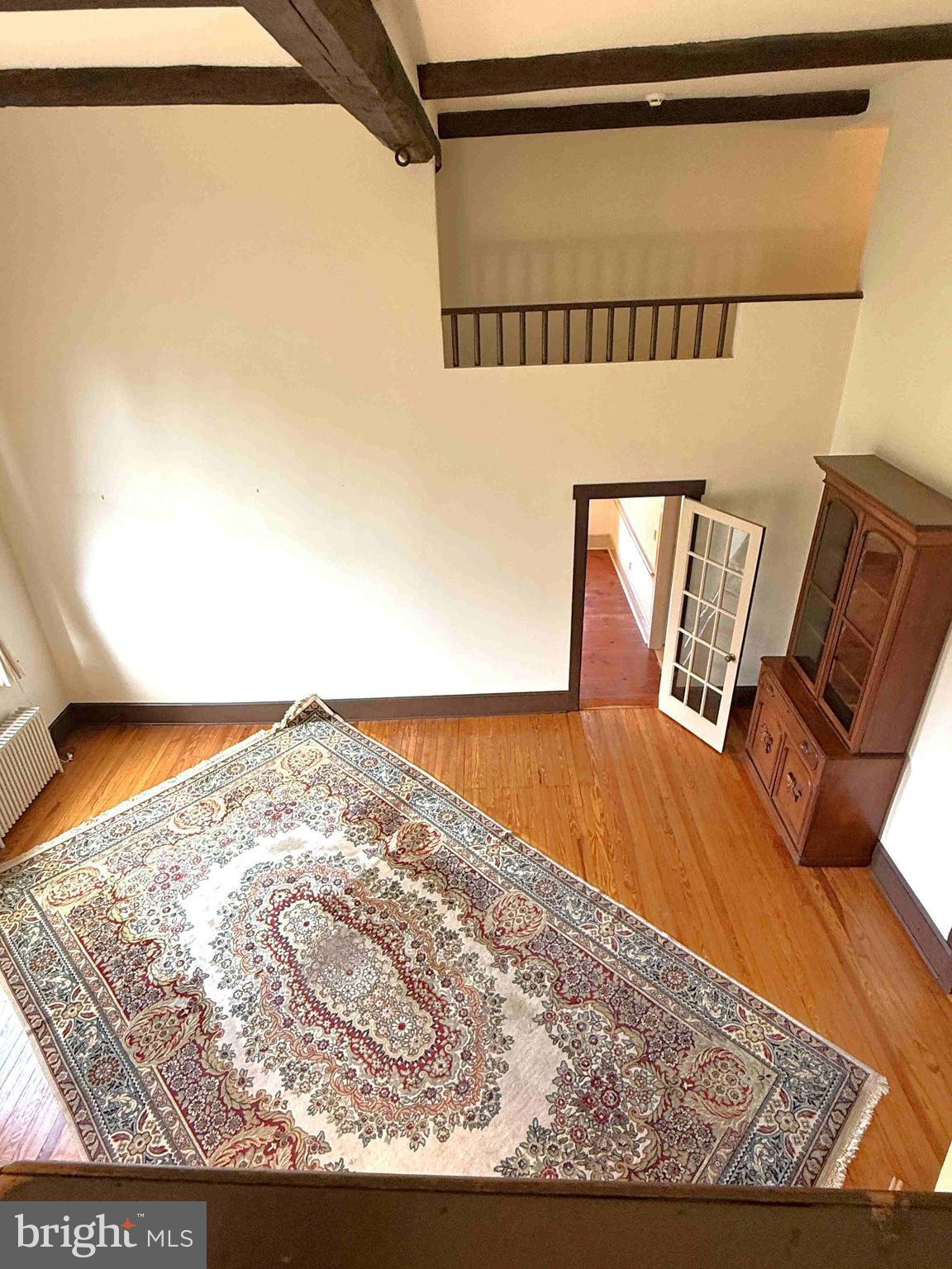 574 Cinder Road New Providence, PA 17560 - Photo 5 of 15 a view of wooden floor in a living room