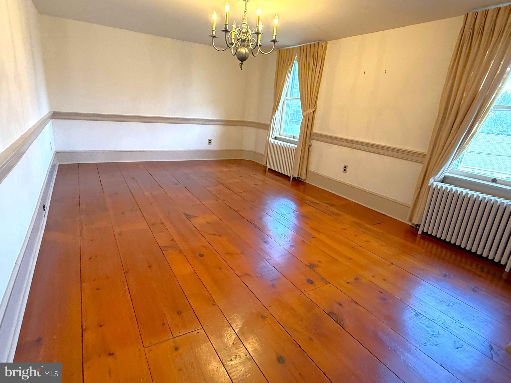 574 Cinder Road New Providence, PA 17560 - Photo 8 of 15 a view of a room with wooden floor and door