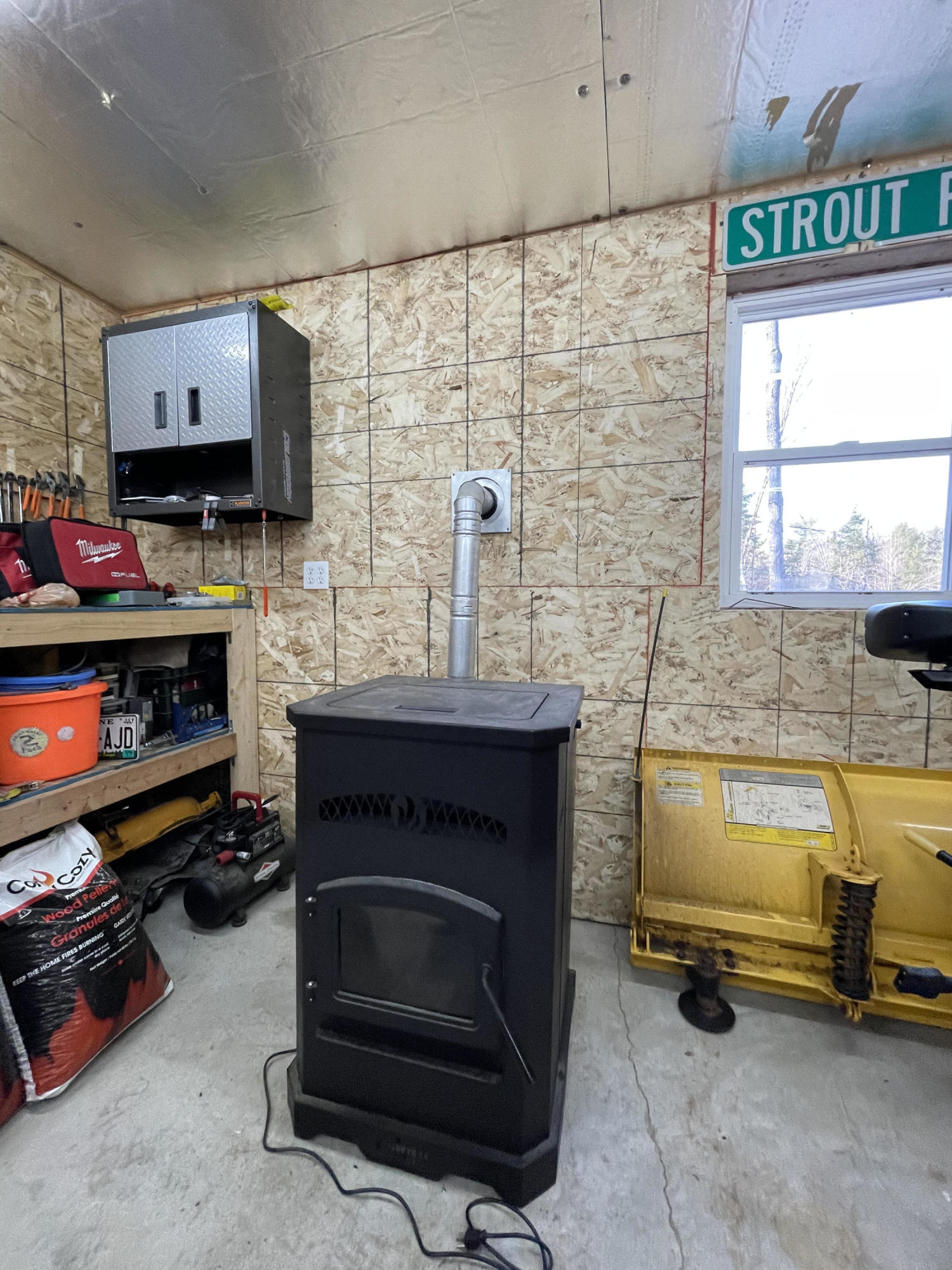585 Exeter Road Corinth, ME 04427 - Photo 35 of 40 Pellet Stove in Garage