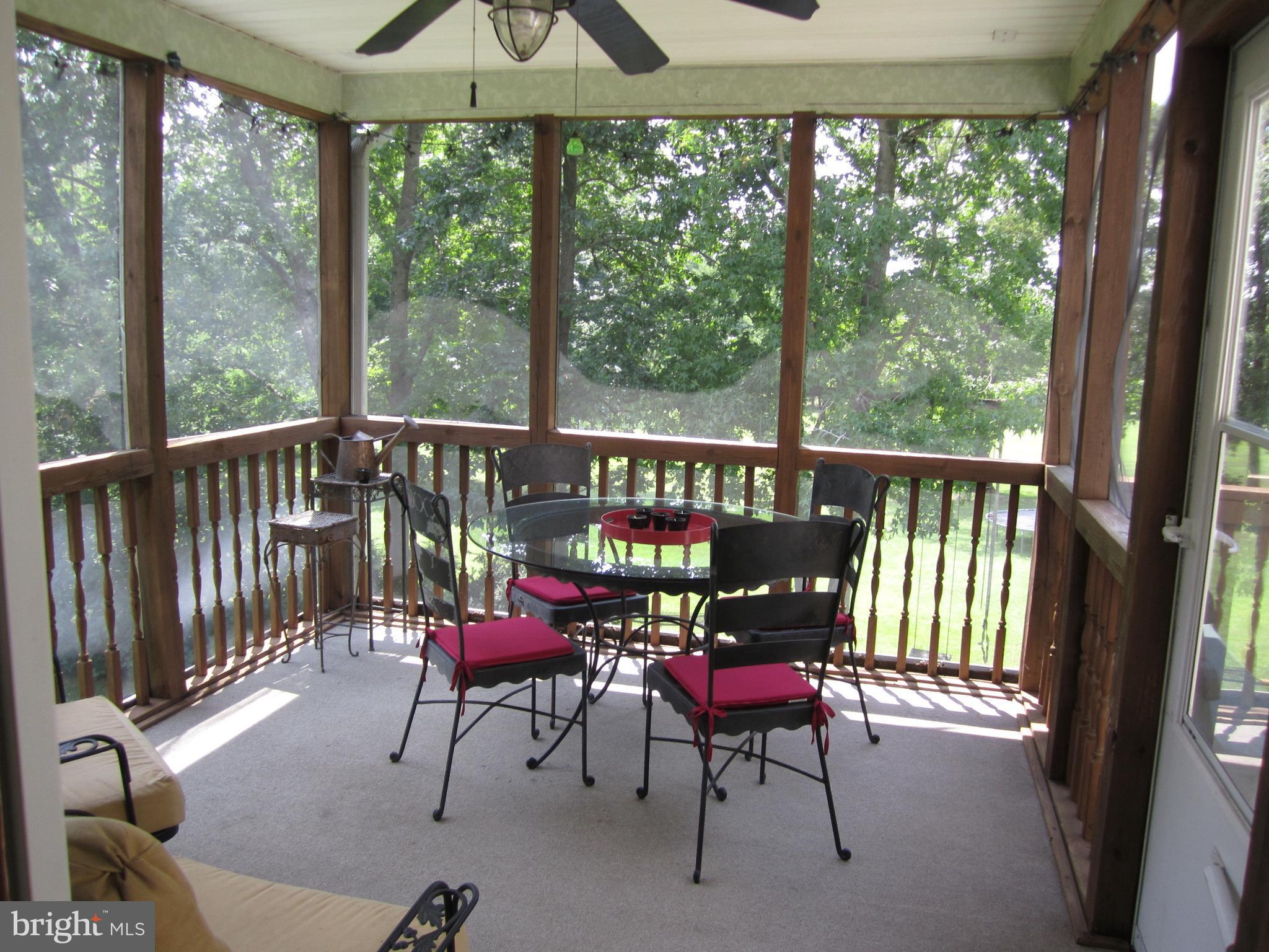 1924 Hatfield Road Huntingtown, MD 20639 - Photo 6 of 22 Screened room of deck
