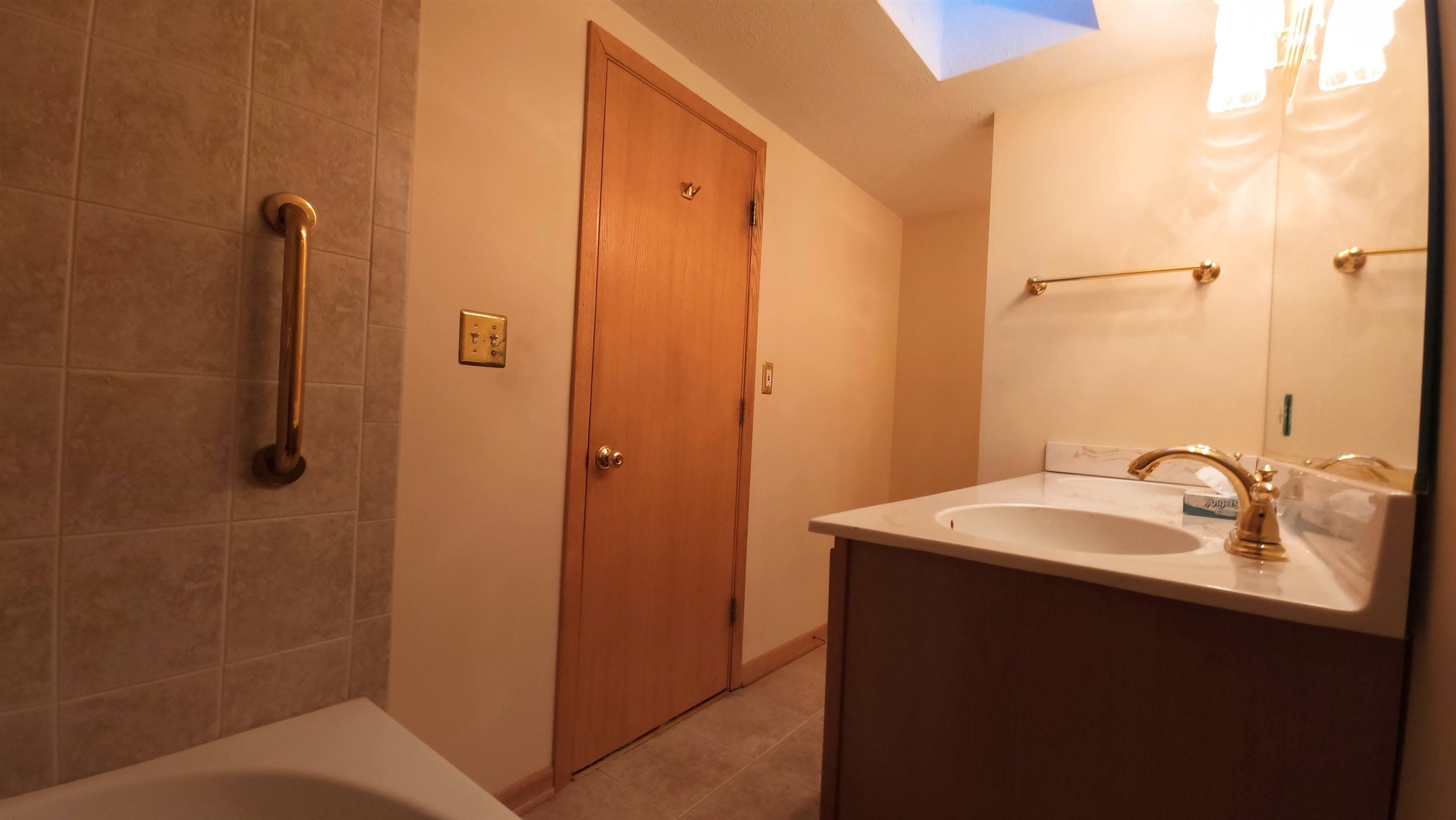 470 Brookside Road North Barrington, IL 60010 - Photo 12 of 38 a bathroom with a sink and mirror
