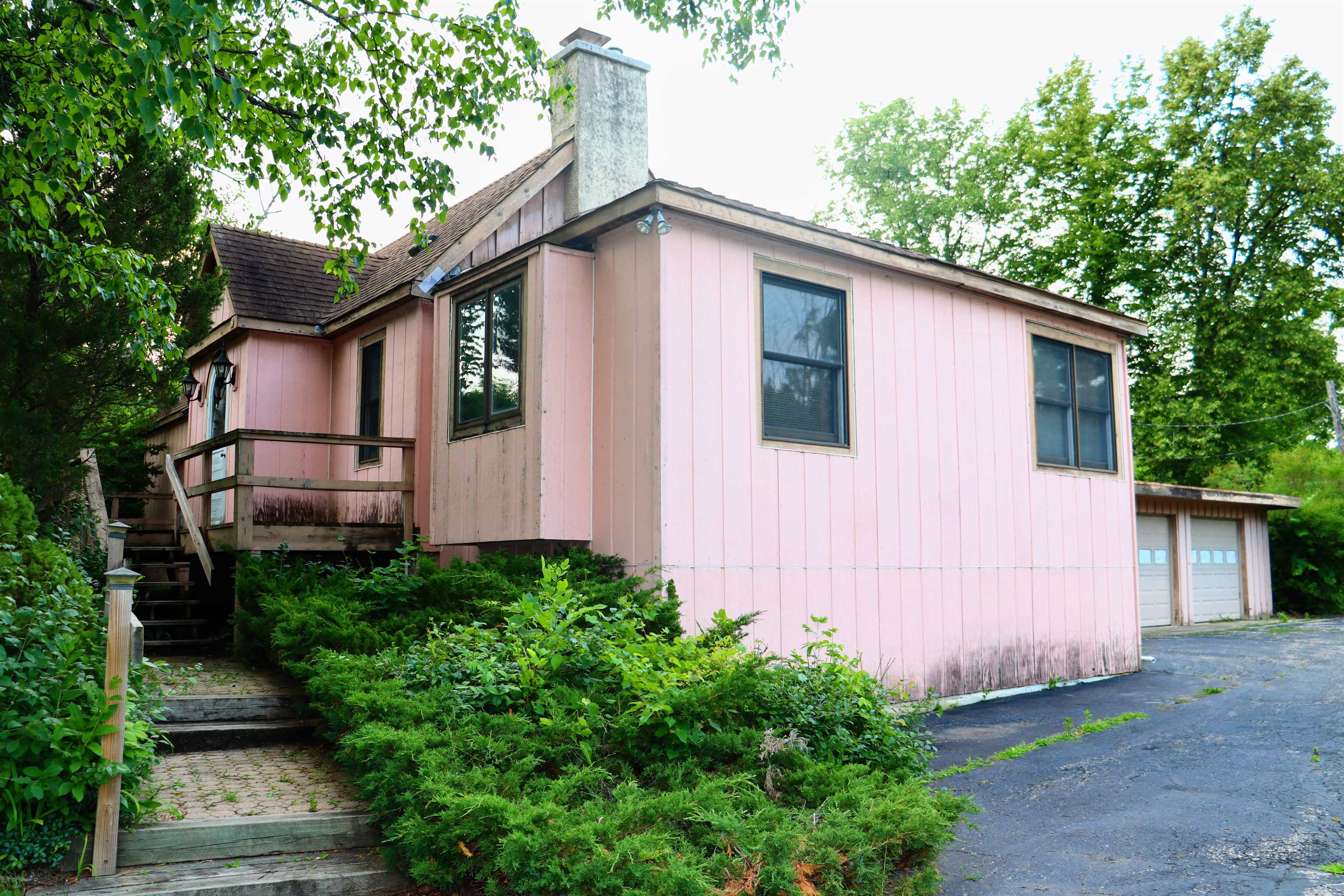 470 Brookside Road North Barrington, IL 60010 - Photo 2 of 38 a view of a house with a yard plants and large tree