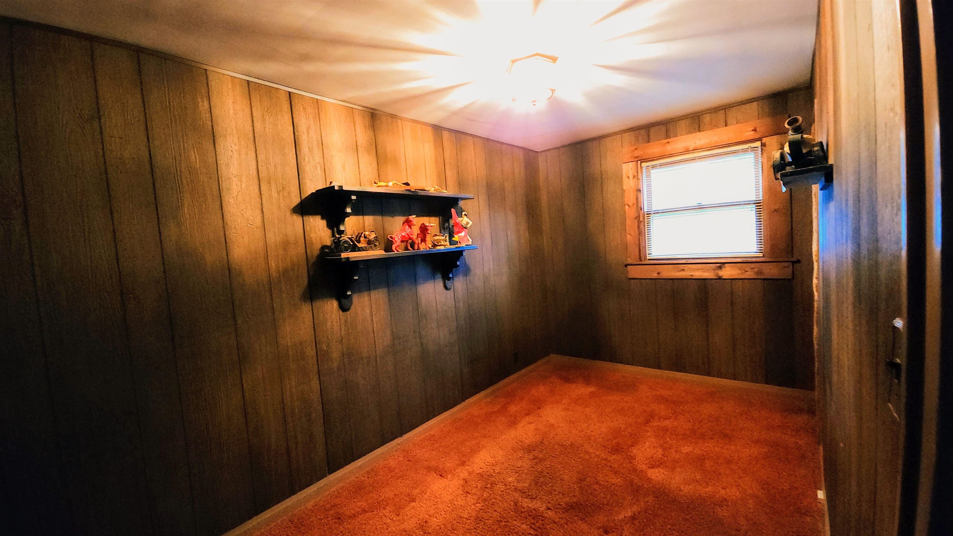 470 Brookside Road North Barrington, IL 60010 - Photo 26 of 38 a bedroom with a bed and a chandelier