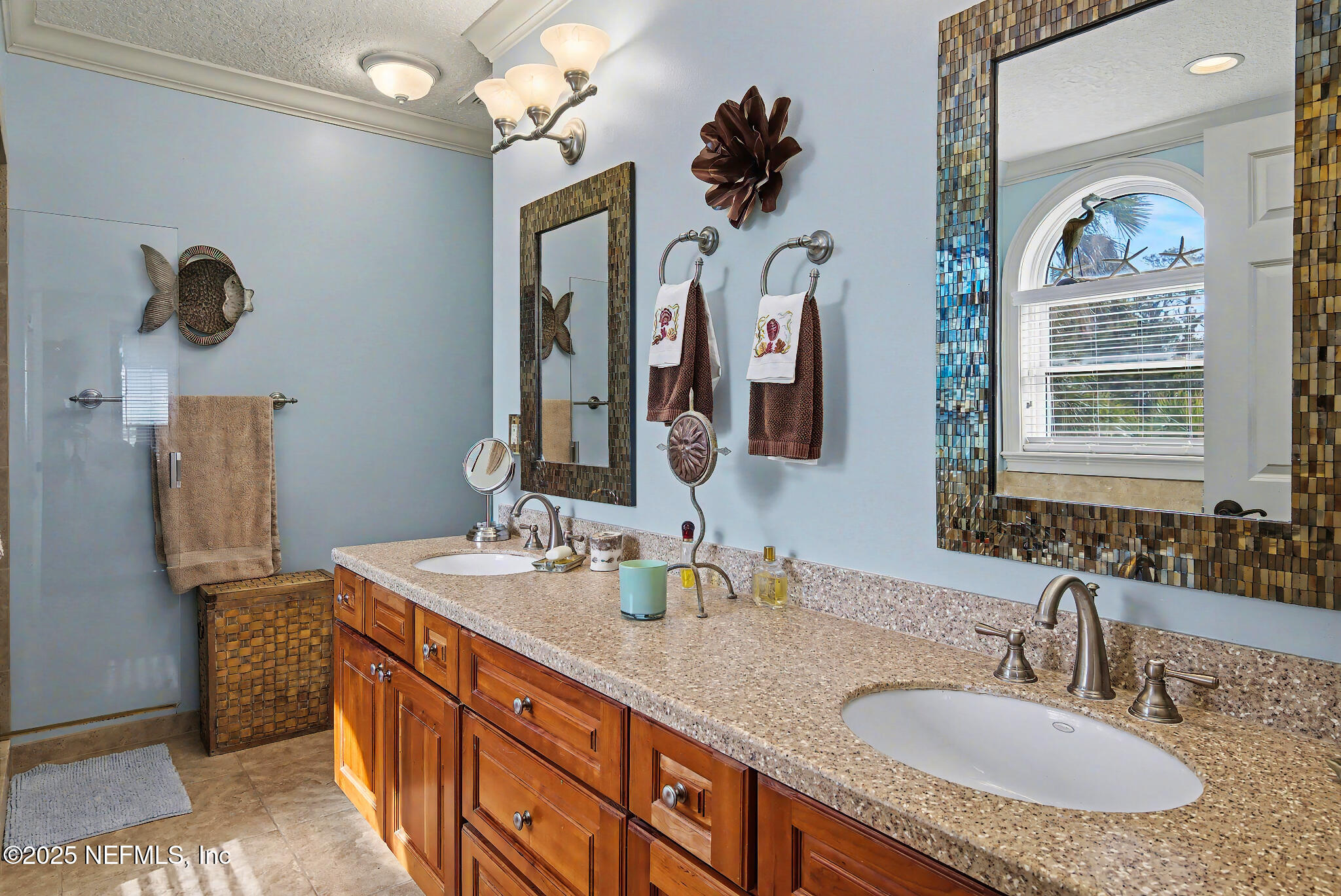 1 Radio Road, Unit 203 St. Augustine, FL 32084 - Photo 26 of 57 a bathroom with a sink double vanity granite and a mirror