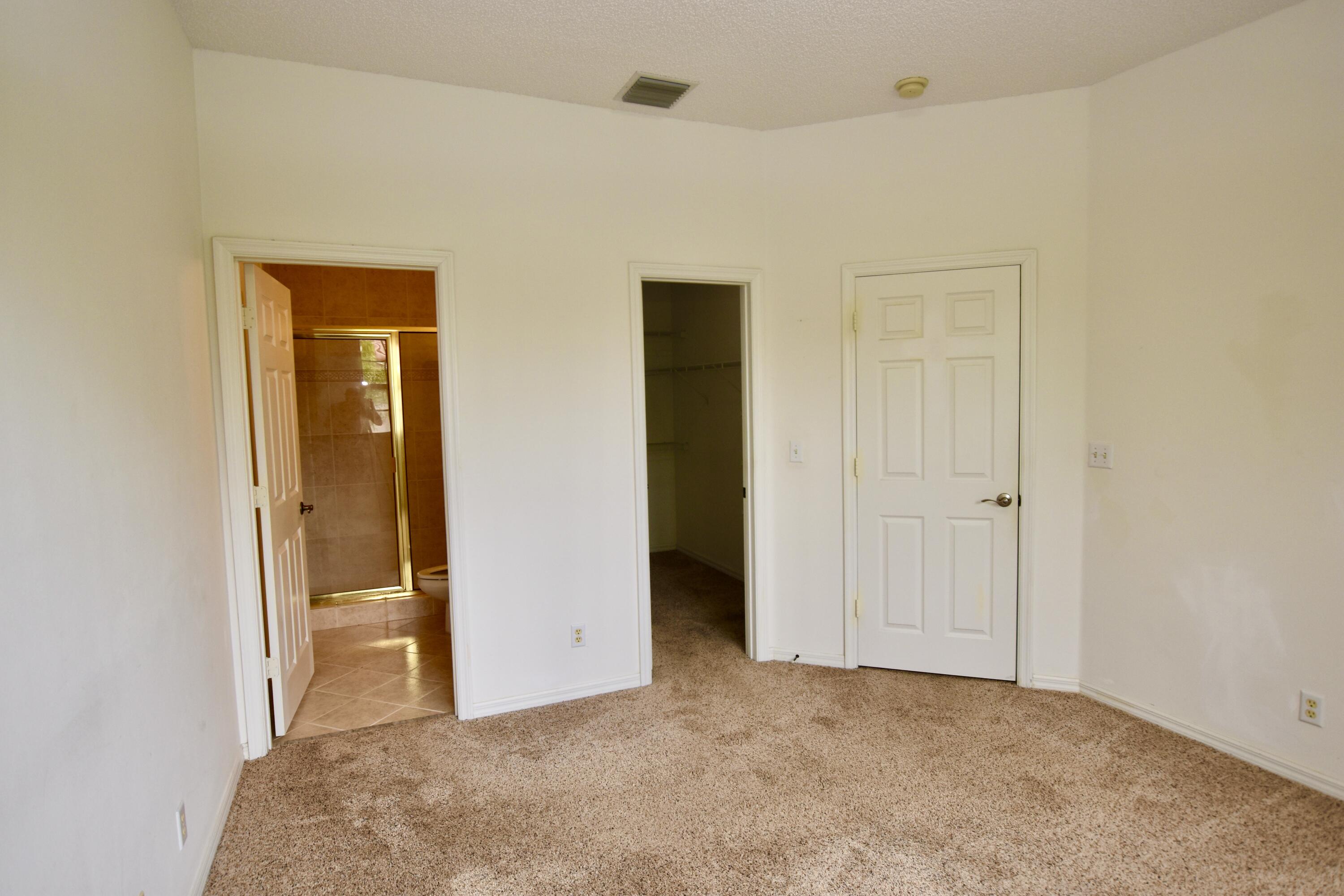 106 Lighthouse Circle, Unit J Tequesta, FL 33469 - Photo 9 of 32 Primary Bedroom