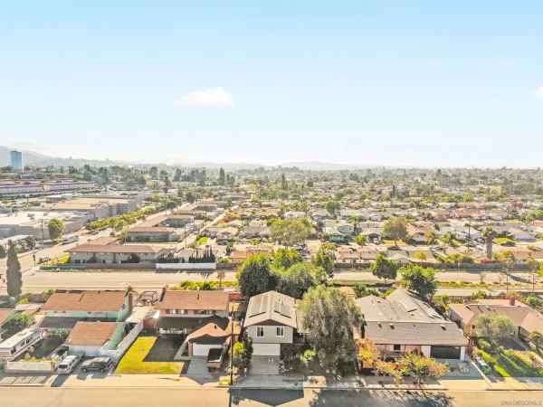 an aerial view of residential building and parking space