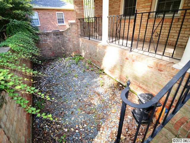1314 Erinshire Road Charlotte, NC 28211 - Photo 15 of 16 a view of a balcony with a tree