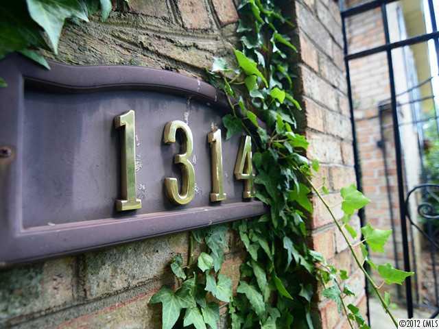 1314 Erinshire Road Charlotte, NC 28211 - Photo 16 of 16 a view of a wooden door of the house