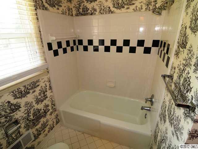 1314 Erinshire Road Charlotte, NC 28211 - Photo 8 of 16 a bathroom with a bathtub and a shower