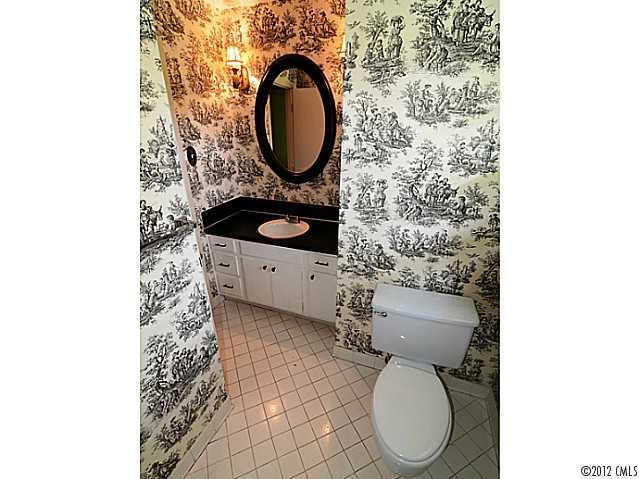 1314 Erinshire Road Charlotte, NC 28211 - Photo 9 of 16 a bathroom with a toilet and a sink