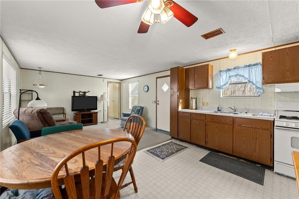 347 Norma Road Dawsonville, GA 30534 - Photo 12 of 33 a view of a dining room with furniture