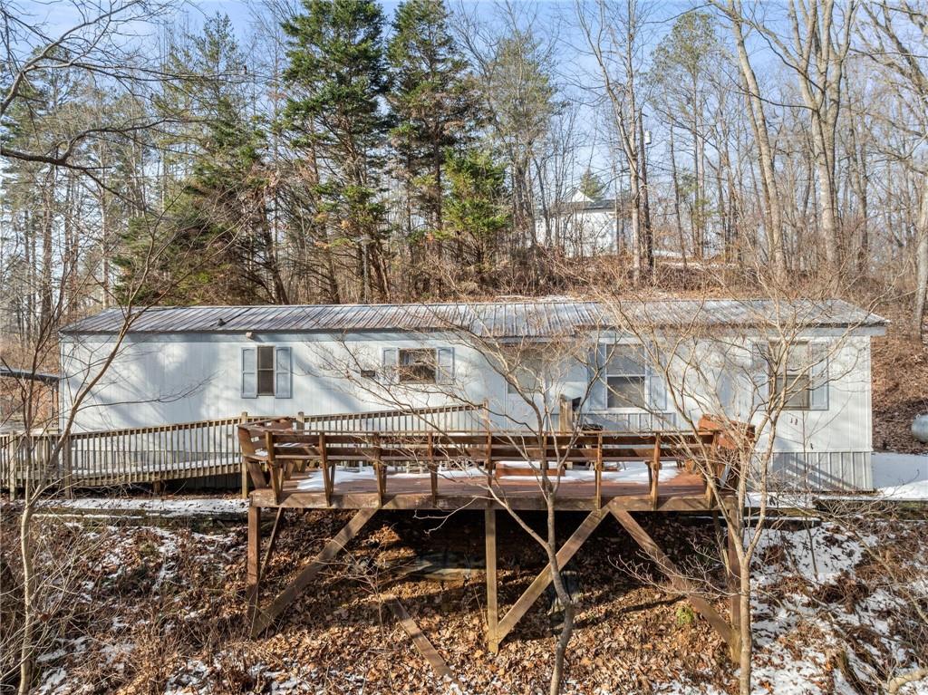 347 Norma Road Dawsonville, GA 30534 - Photo 20 of 33 a view of a chairs and table on the house