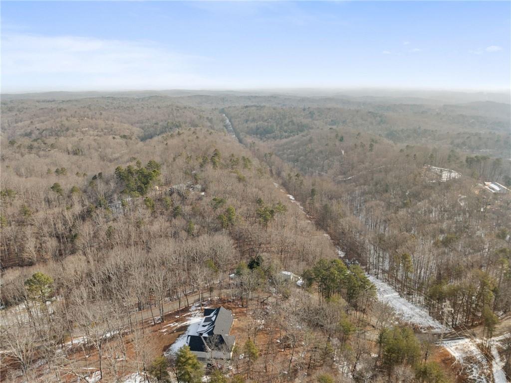 347 Norma Road Dawsonville, GA 30534 - Photo 28 of 33 a view of city and mountain in middle of forest