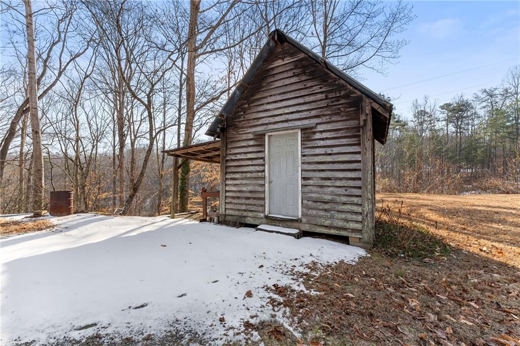 347 Norma Road Dawsonville, GA 30534 - Photo 3 of 33 a view of a house with a yard