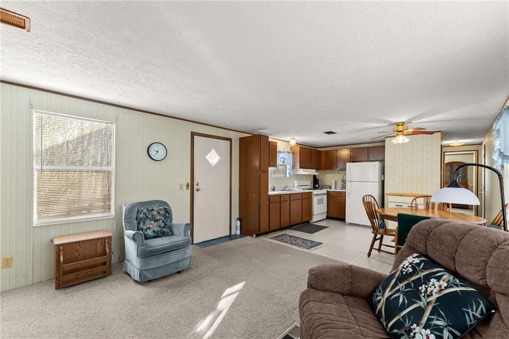 347 Norma Road Dawsonville, GA 30534 - Photo 7 of 33 a living room with furniture and a window