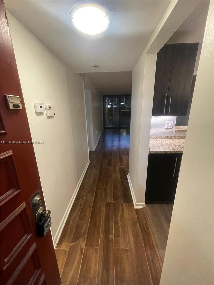 10825 Southwest 112th Avenue, Unit 115 Miami, FL 33176 - Photo 3 of 19 MAIN DOOR