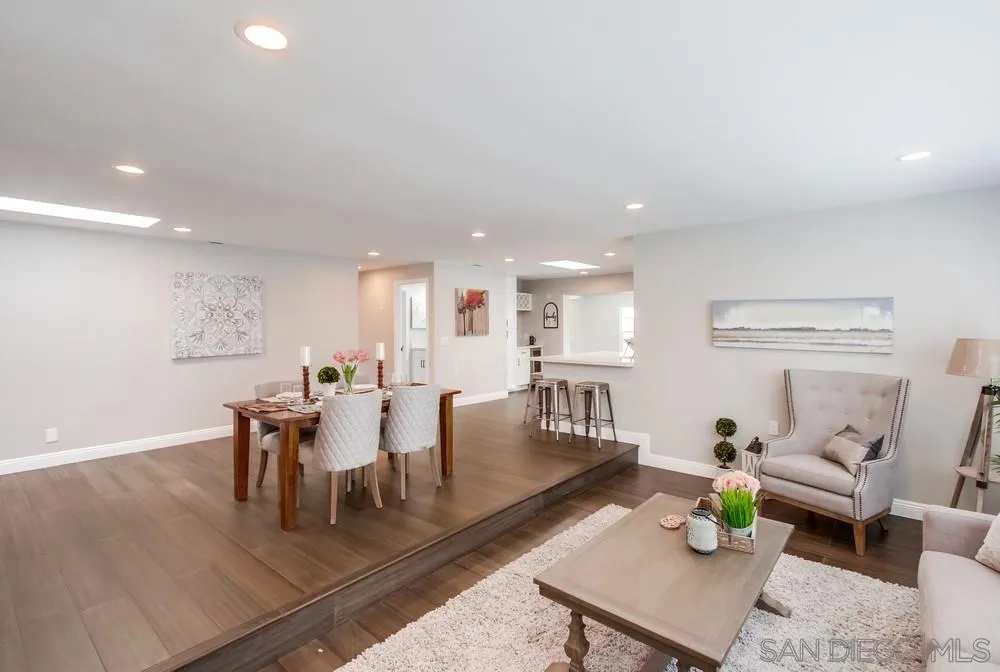 8348 Rumson Drive Santee, CA 92071 - Photo 11 of 53 a view of a dining room with furniture and wooden floor