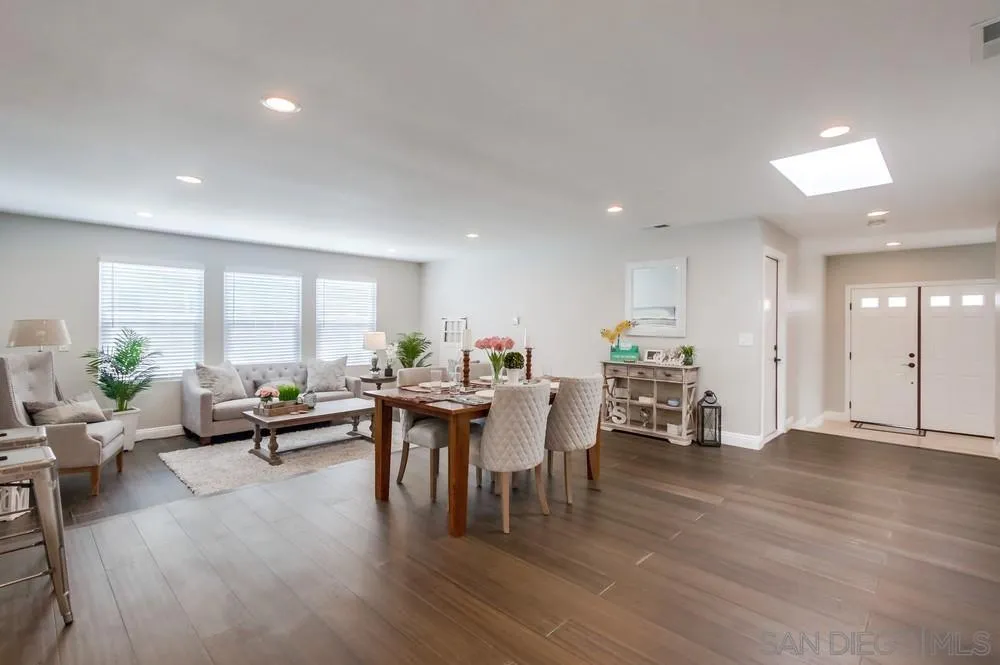 8348 Rumson Drive Santee, CA 92071 - Photo 14 of 53 a living room with furniture a wooden floor and a large window
