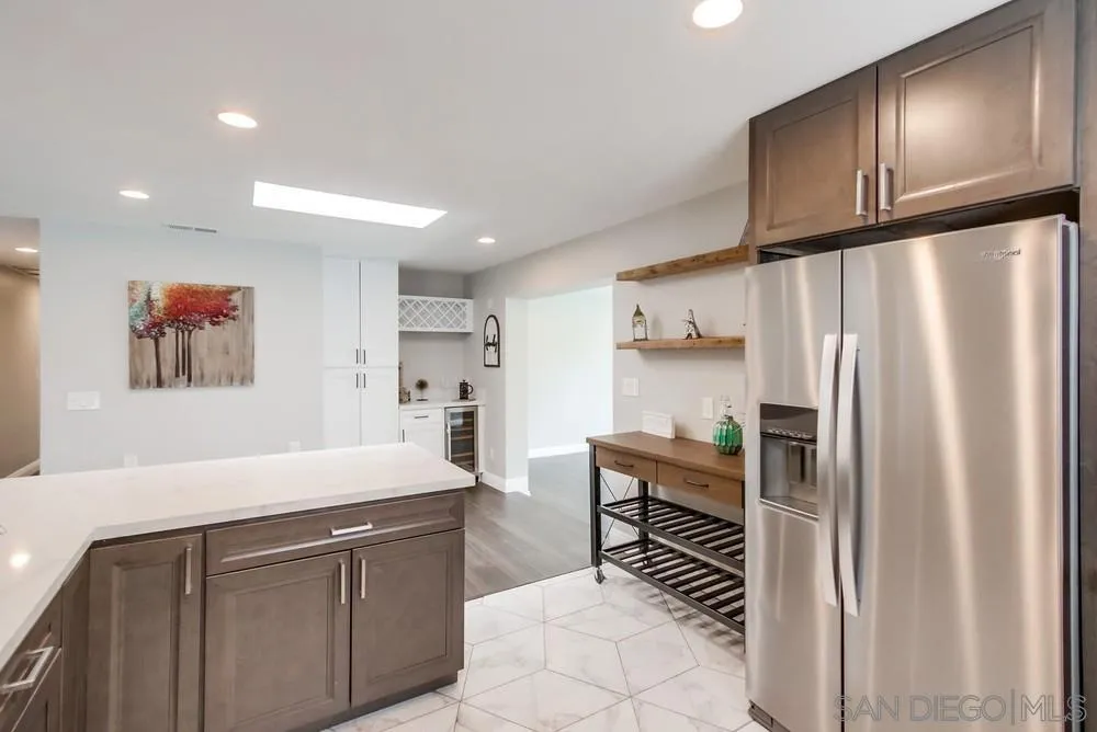 8348 Rumson Drive Santee, CA 92071 - Photo 20 of 53 a kitchen with refrigerator and cabinets
