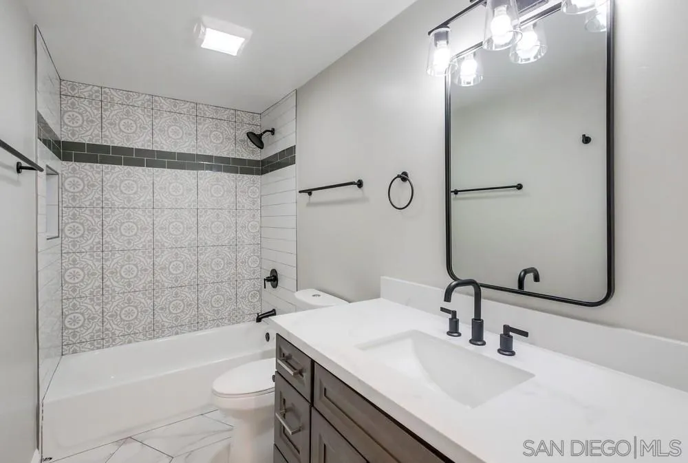8348 Rumson Drive Santee, CA 92071 - Photo 25 of 53 a bathroom with a sink a toilet and shower