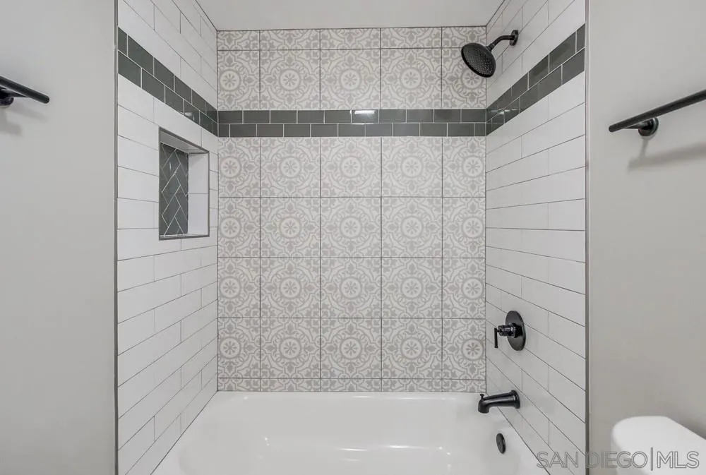 8348 Rumson Drive Santee, CA 92071 - Photo 26 of 53 a bathroom with a shower and a bath tub