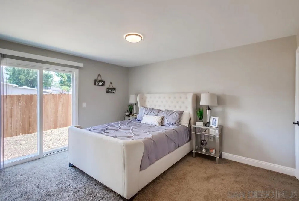 8348 Rumson Drive Santee, CA 92071 - Photo 27 of 53 a bedroom with a bed and a window