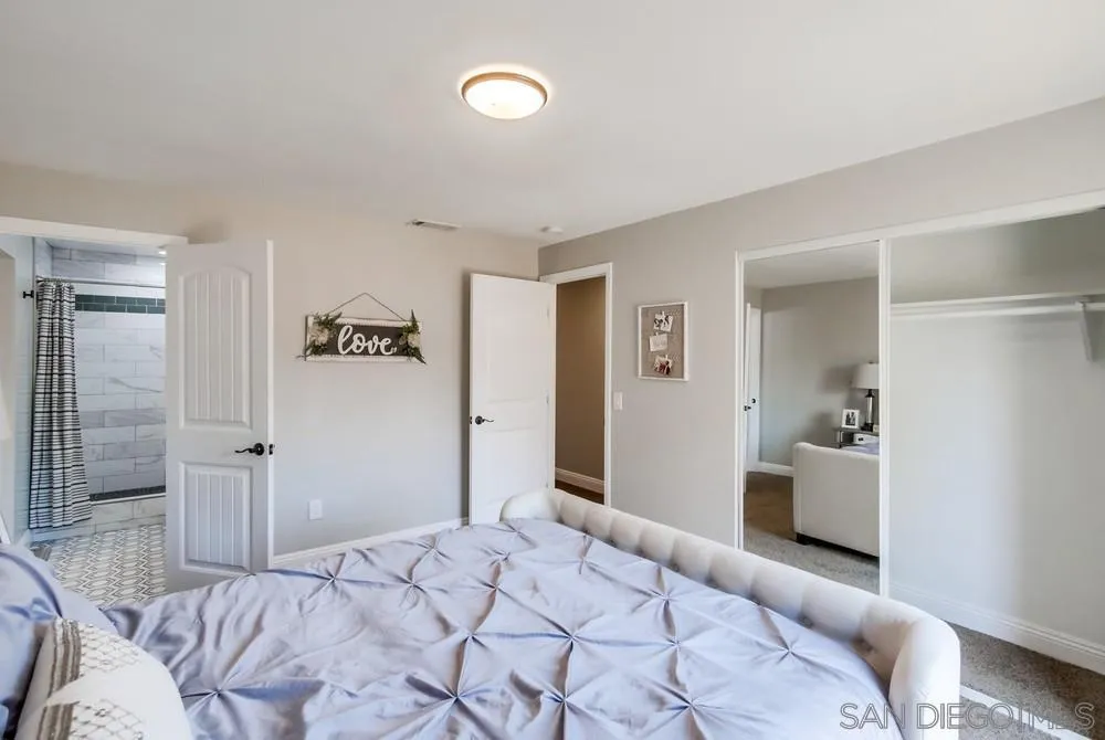 8348 Rumson Drive Santee, CA 92071 - Photo 29 of 53 a bedroom with a bed and a couch