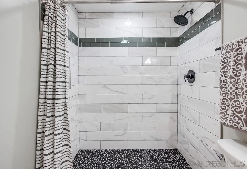 8348 Rumson Drive Santee, CA 92071 - Photo 31 of 53 a bathroom with a shower