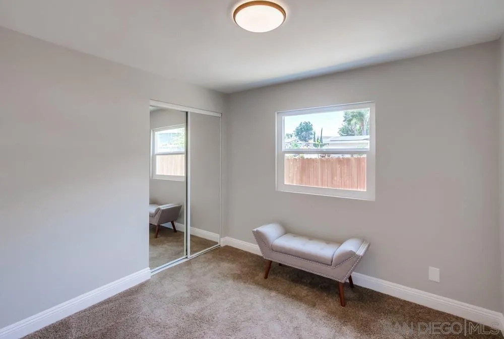 8348 Rumson Drive Santee, CA 92071 - Photo 33 of 53 a living room with furniture and a window