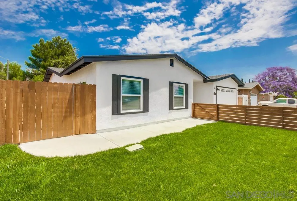 8348 Rumson Drive Santee, CA 92071 - Photo 4 of 53 a front view of a house with a yard