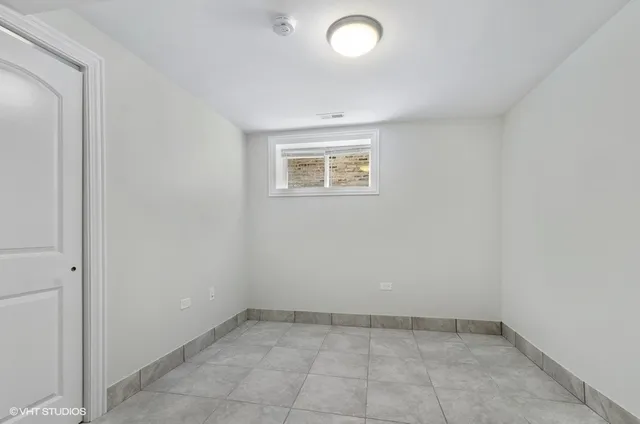 an empty room with a workbench