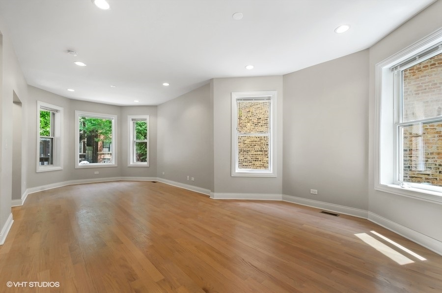 5816 North Ridge Avenue, Unit 1F Chicago, IL 60660 - Photo 2 of 18 a view of an empty room with a window
