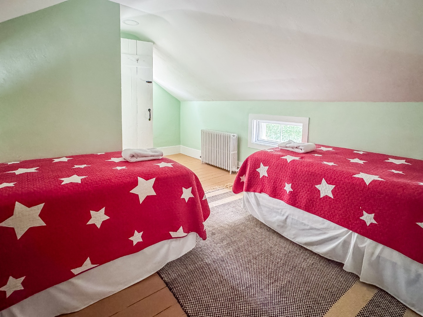 69 School Street Edgartown, MA 02539 - Photo 14 of 23 a bedroom with a bed and two lamp