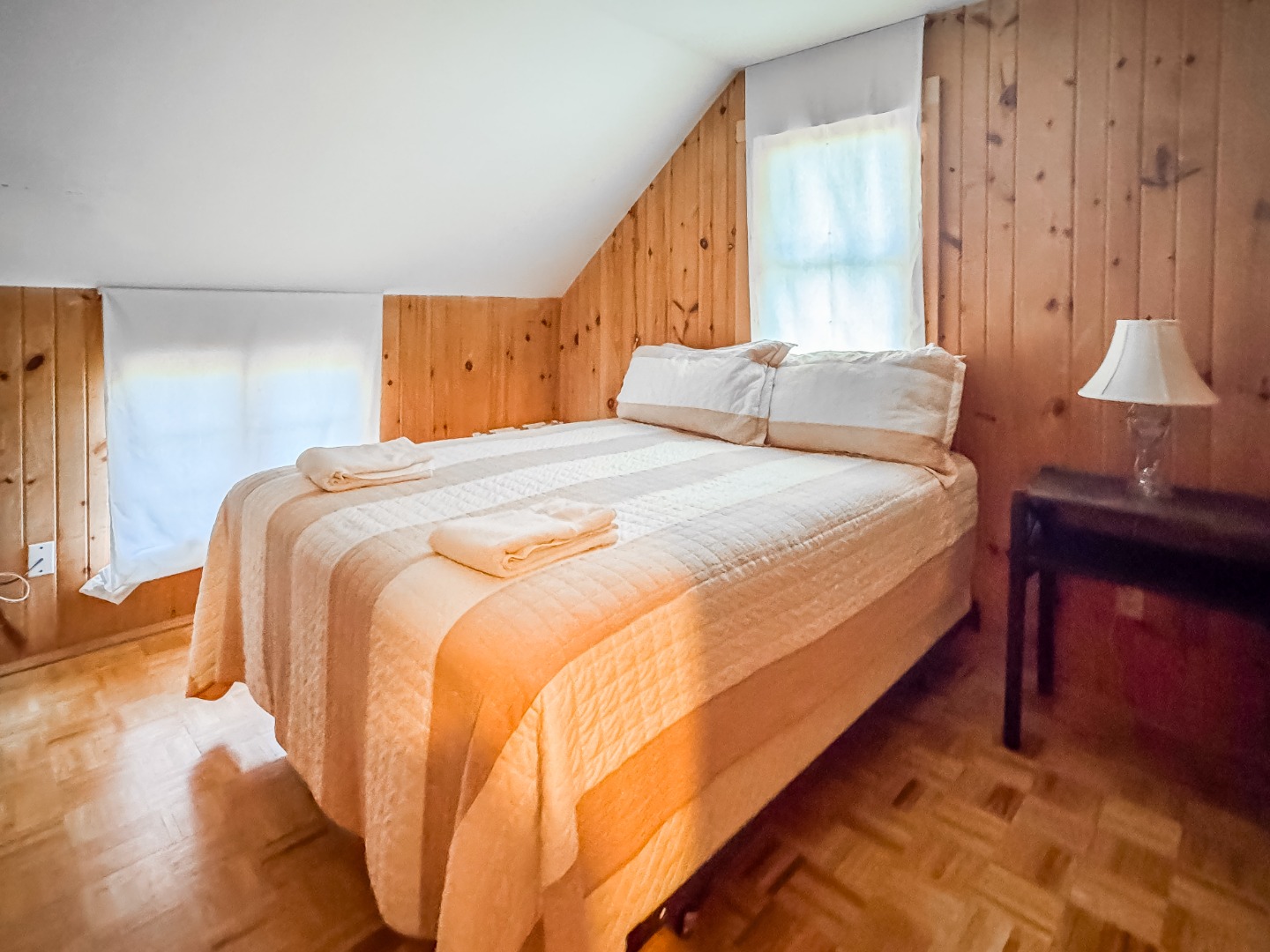 69 School Street Edgartown, MA 02539 - Photo 23 of 23 a bedroom with bed and window