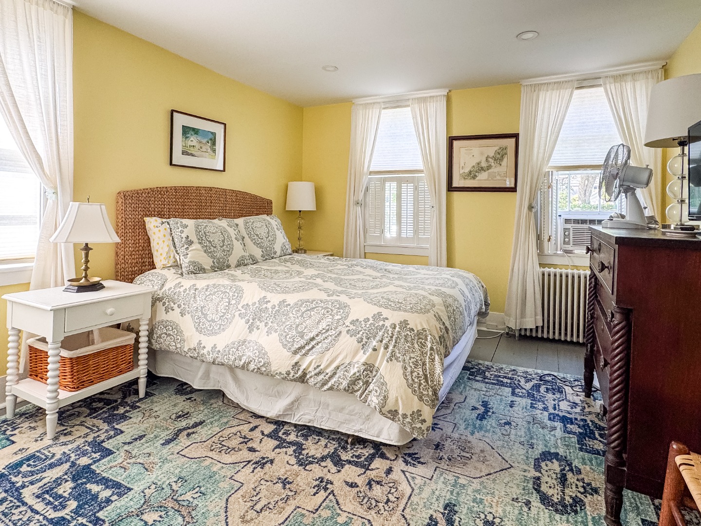 69 School Street Edgartown, MA 02539 - Photo 10 of 23 a bedroom with a bed and a window