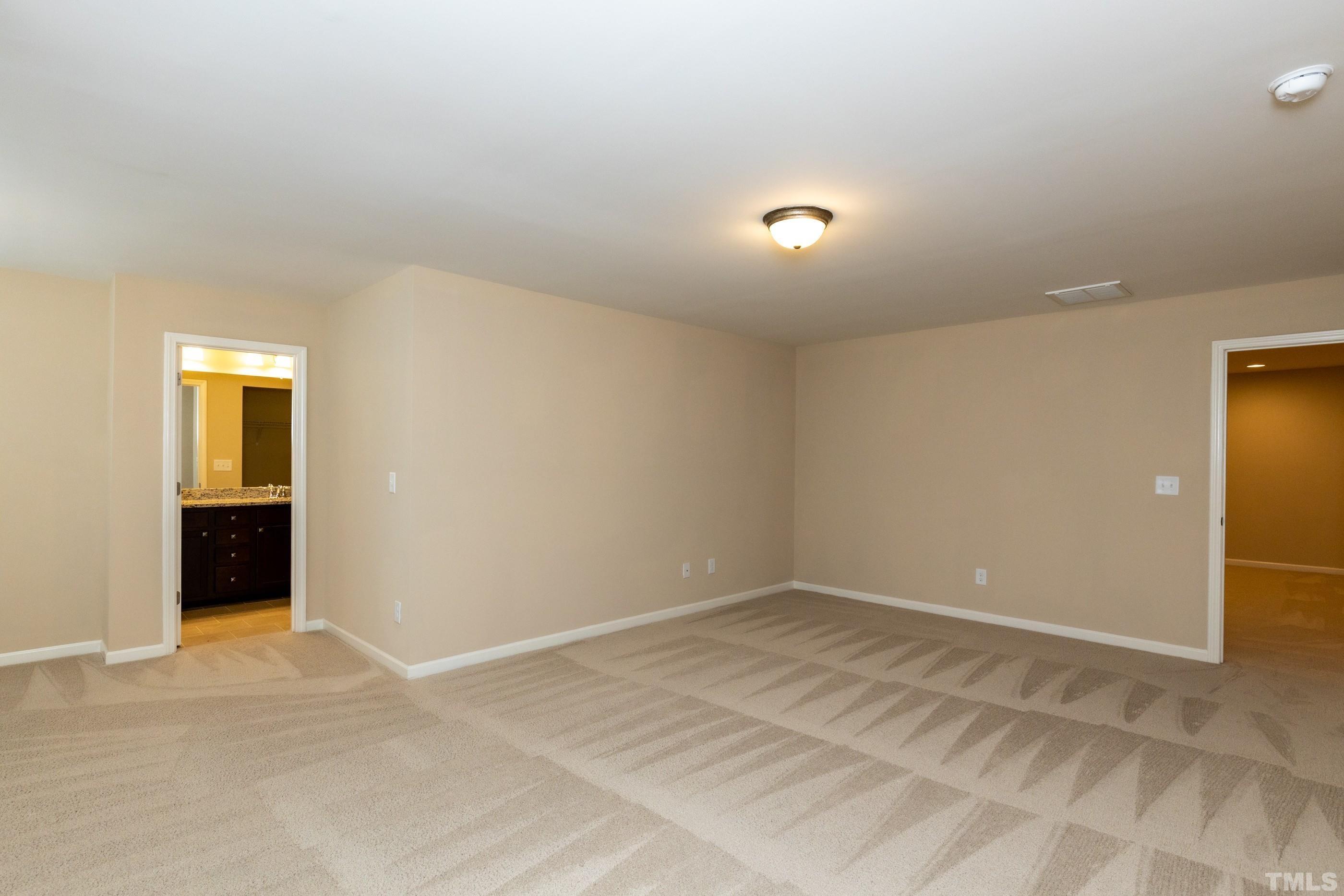 566 Chessie Station Apex, NC 27502 - Photo 18 of 29 a view of an empty room