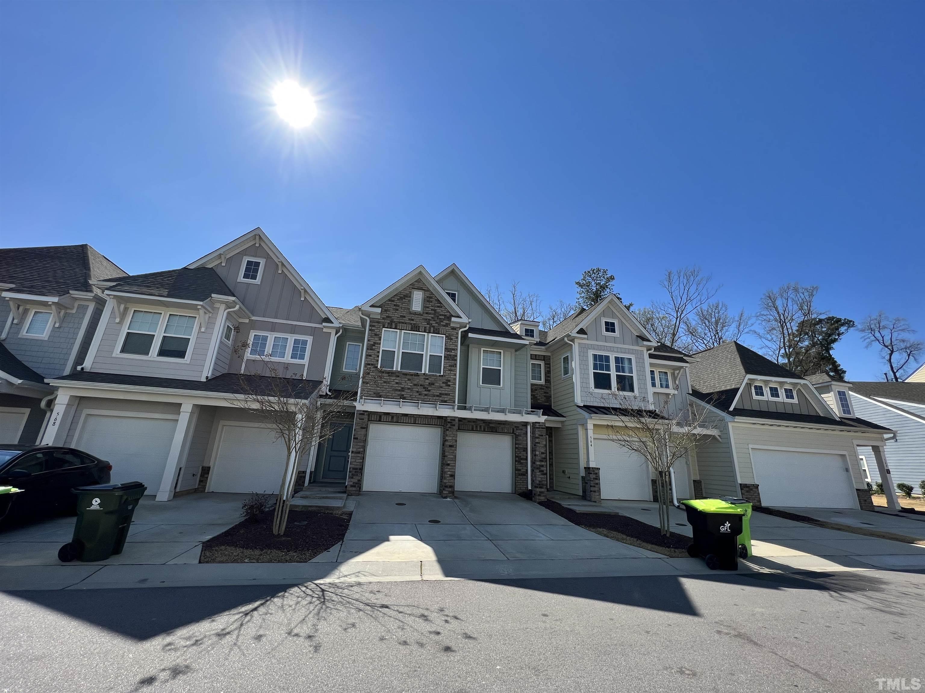 566 Chessie Station Apex, NC 27502 - Photo 2 of 29 a front view of a house with a yard