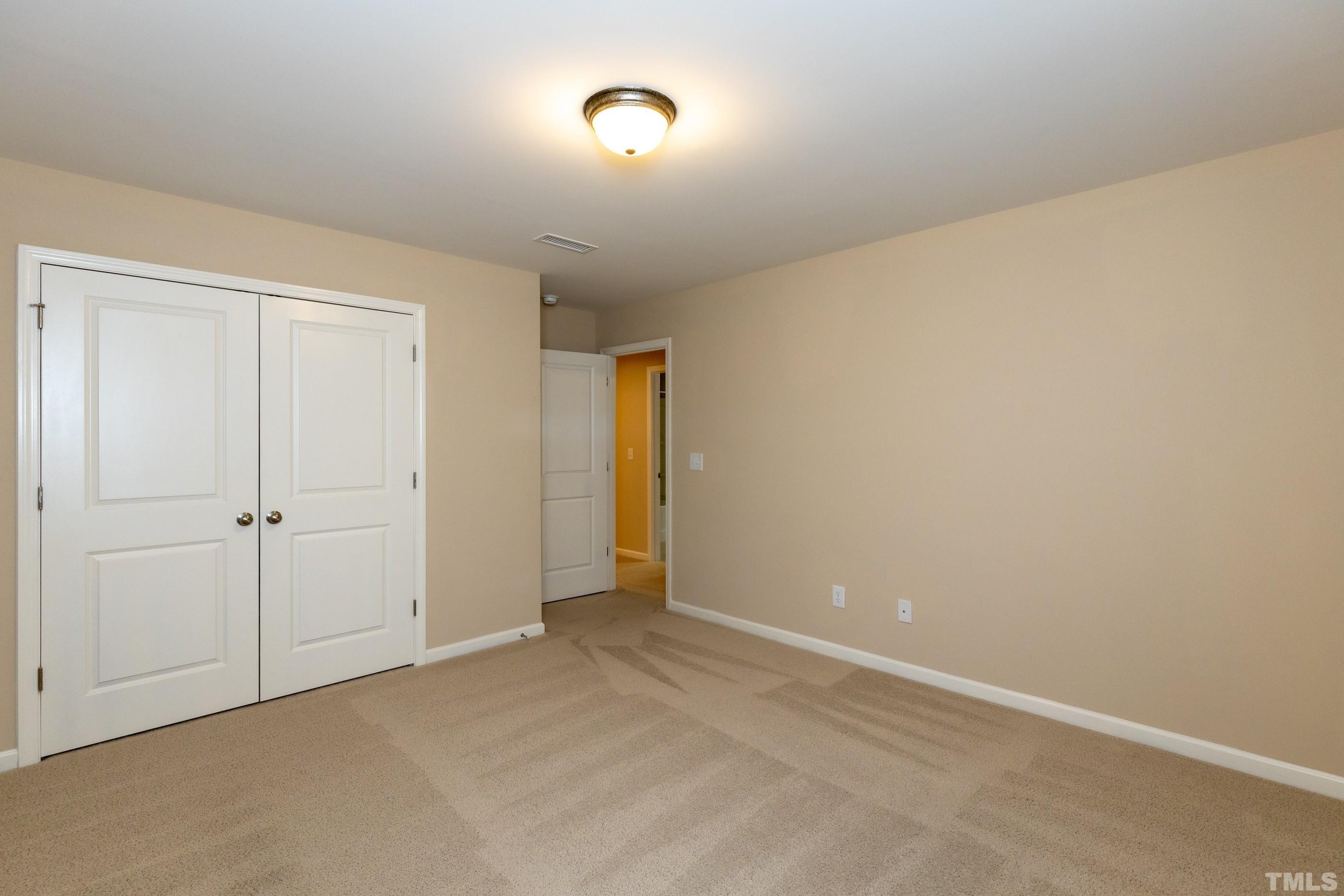 566 Chessie Station Apex, NC 27502 - Photo 25 of 29 a view of an empty room