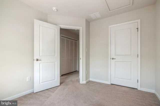 an empty room with closet