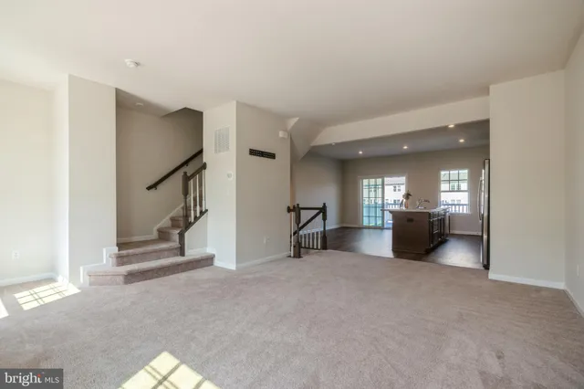 a view of a livingroom with a staircase