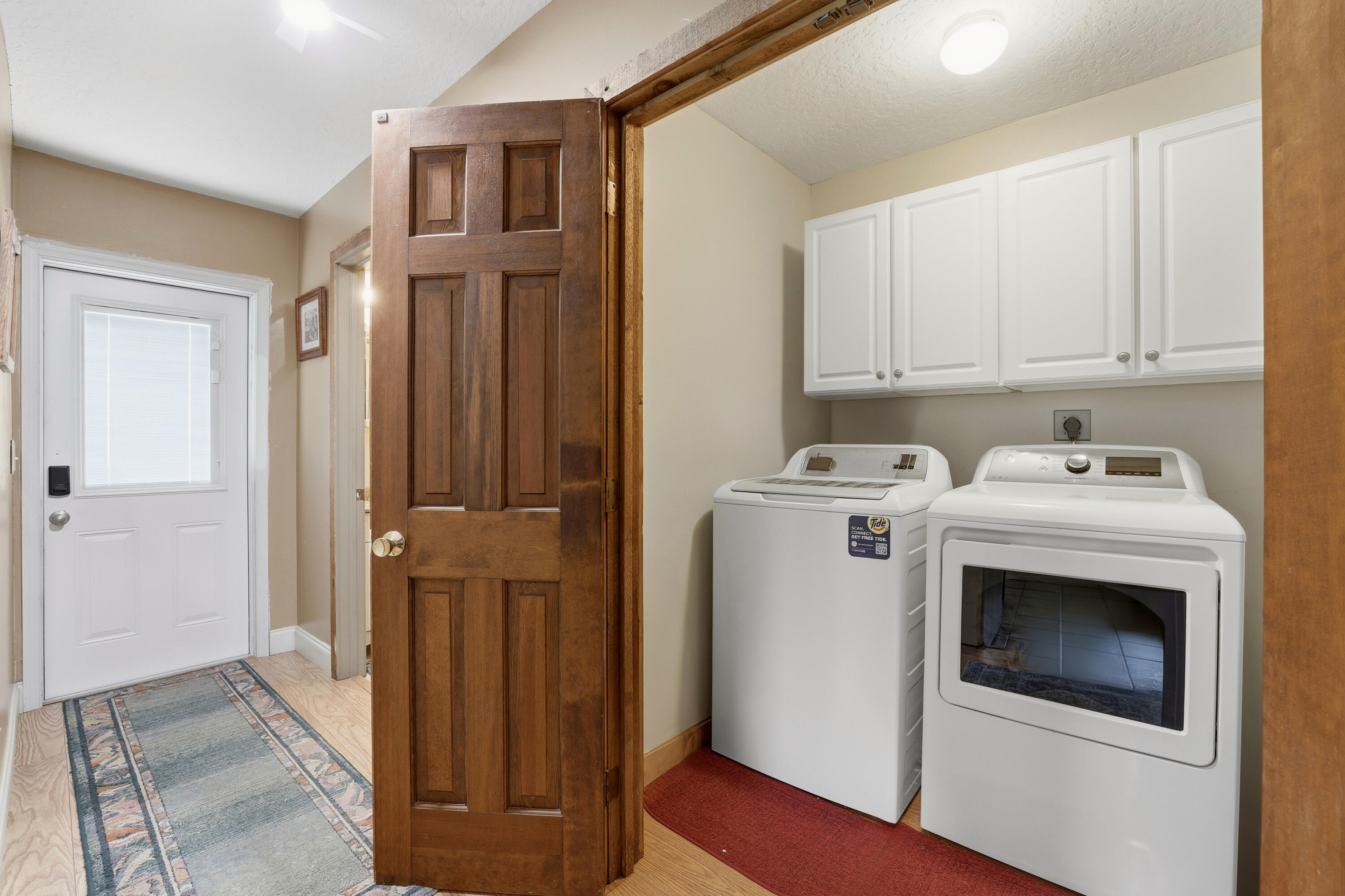 14095 Biddex Road Loxahatchee Groves, FL 33470 - Photo 26 of 69 a utility room with dryer and washer