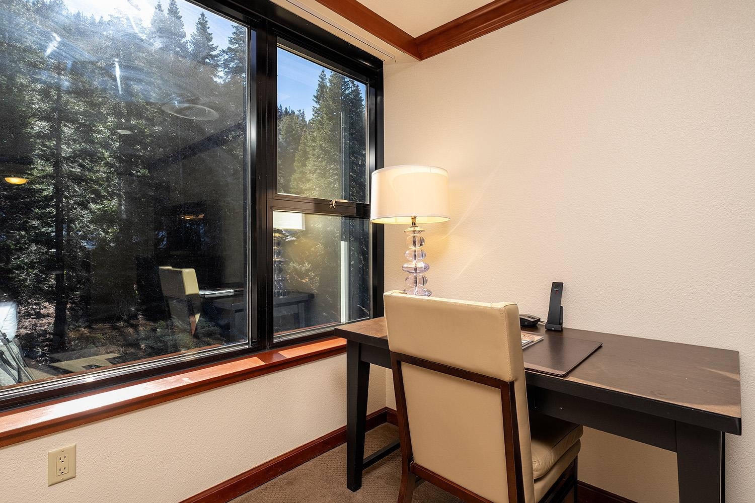 400 Resort Road, Unit 635 Olympic Valley, CA 96146 - Photo 4 of 23 a view of balcony with two chairs and a potted plant