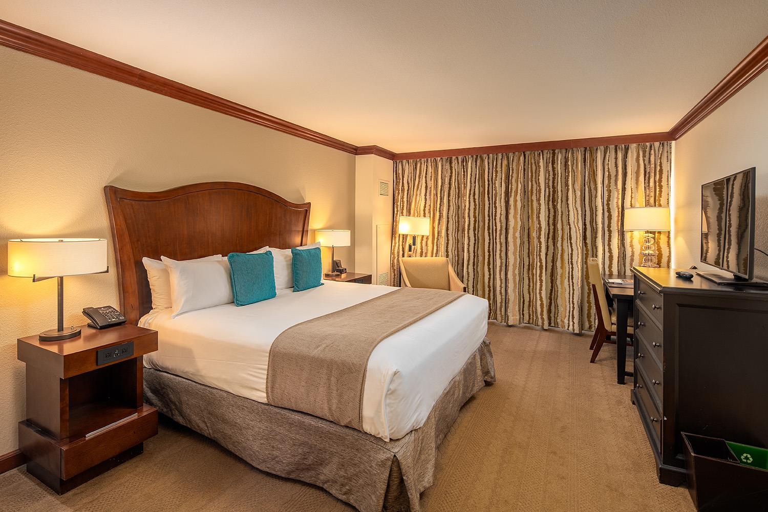 400 Resort Road, Unit 635 Olympic Valley, CA 96146 - Photo 7 of 23 a bedroom with a bed and a flat tv screen on dresser