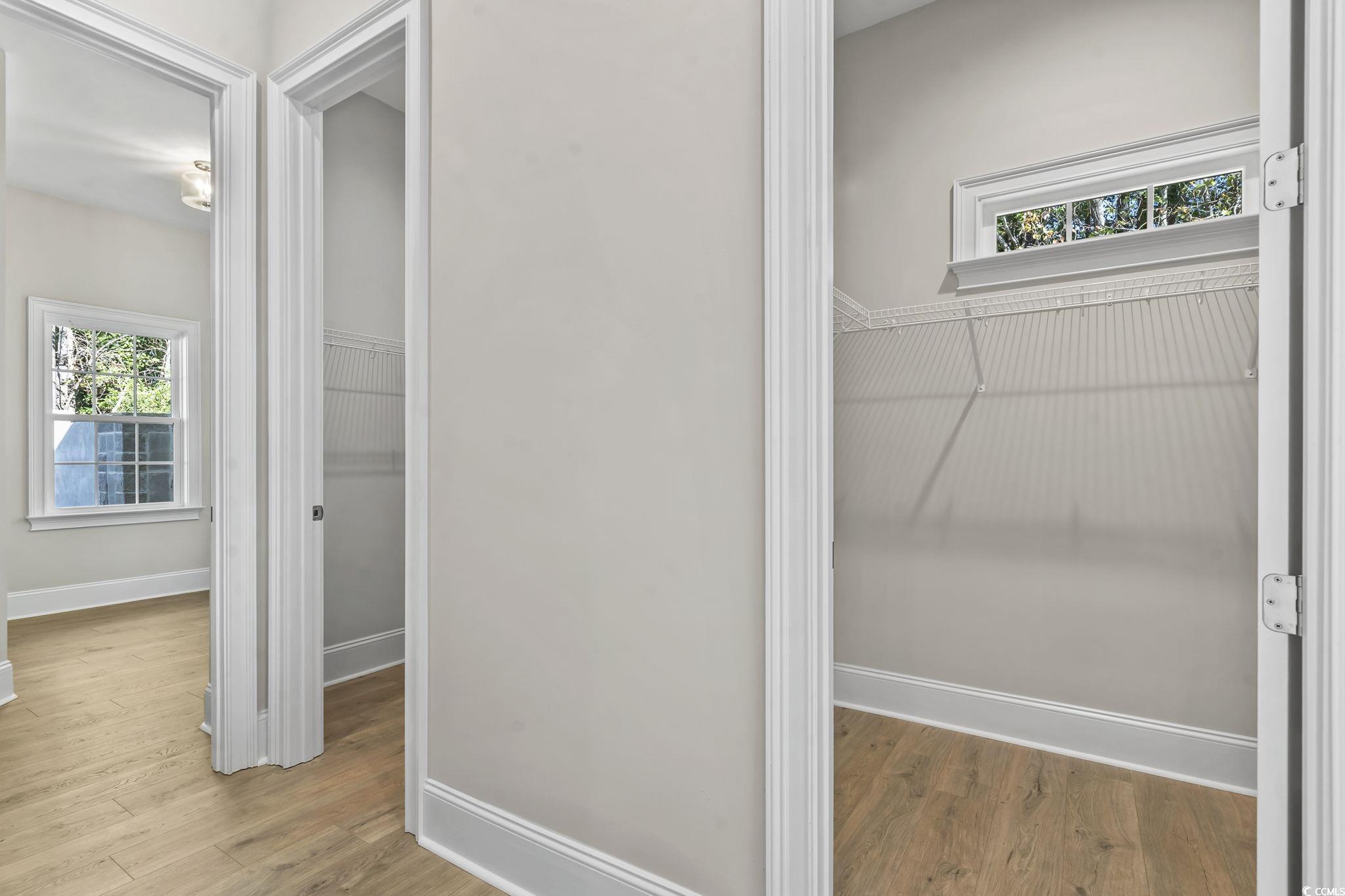 329 Waterfall Circle Little River, SC 29566 - Photo 27 of 39 His and her walk in closets and Office space